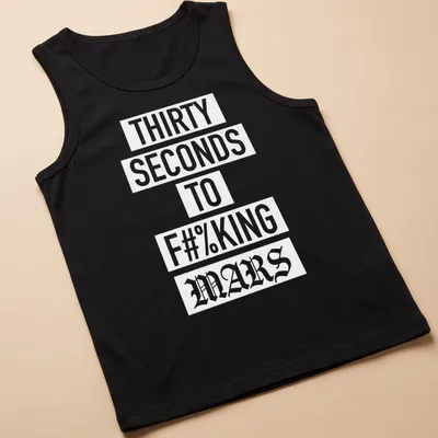 Bold typography T-shirt with band slogan in white on a dark background — printed on a tank top