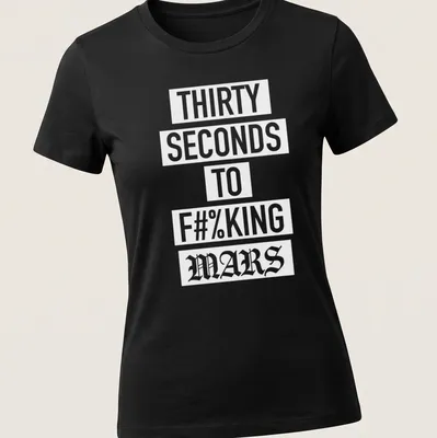 Bold typography T-shirt with band slogan in white on a dark background — printed on a women's shirt