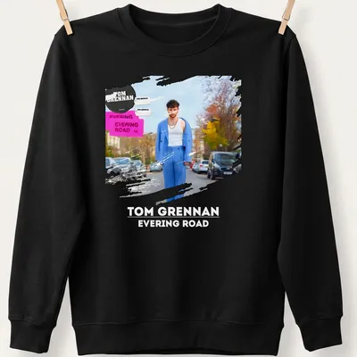 Modern artistic T-shirt featuring Tom Grennan's name with vibrant colors — printed on a unisex sweatshirt