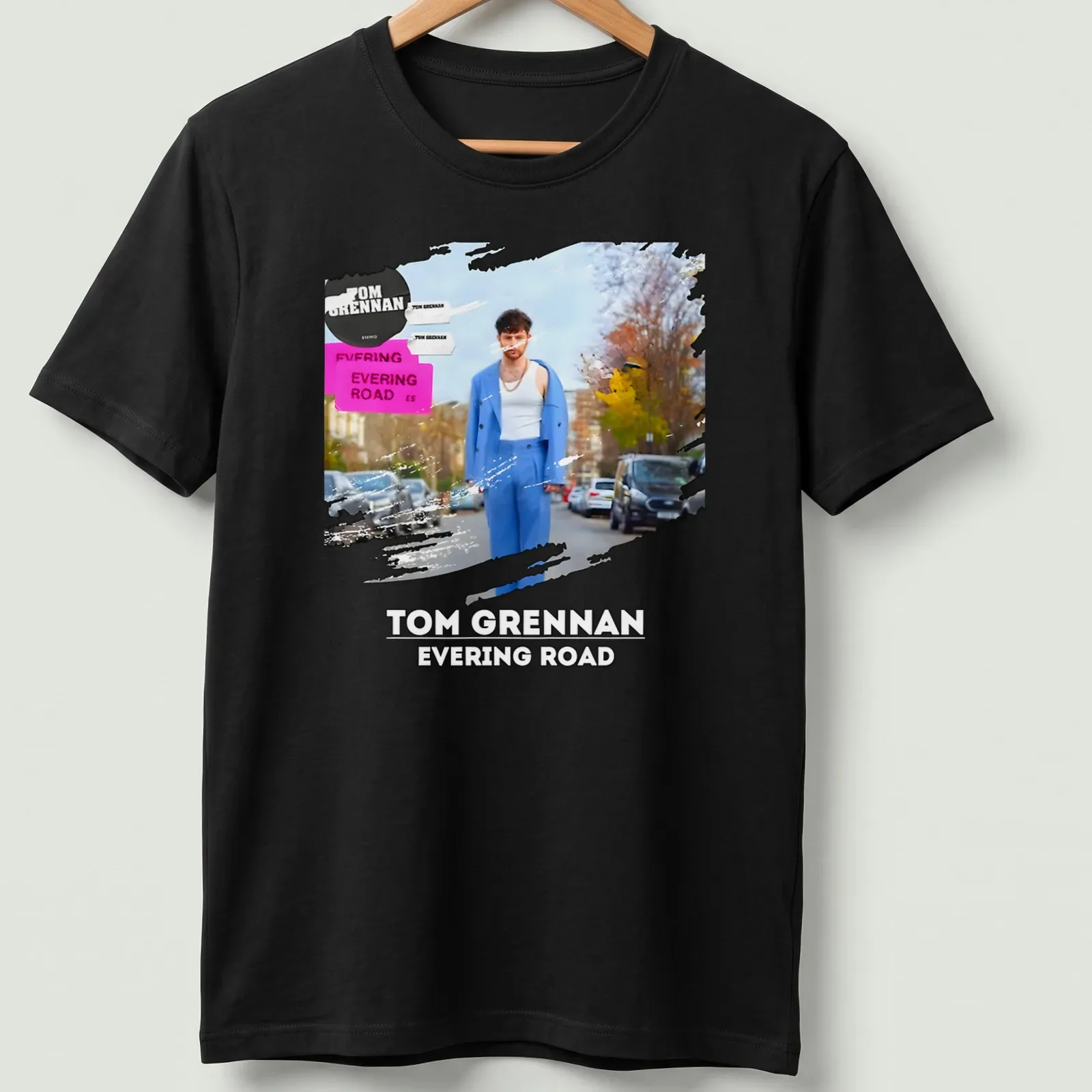 Modern artistic T-shirt featuring Tom Grennan's name with vibrant colors — printed on a unisex t-shirt