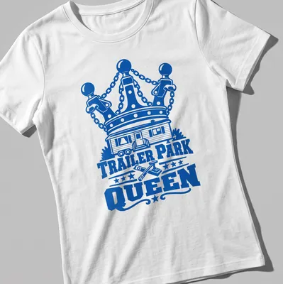Bold graphic tee featuring a trailer park home with a crown above the text 'TRAILER PARK QUEEN' — printed on a women's shirt