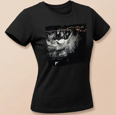 Retro T-shirt featuring the text 'TREASURE Ivo Lorelei Beatrix Persephone Pandora' in black and gold. — printed on a women's shirt