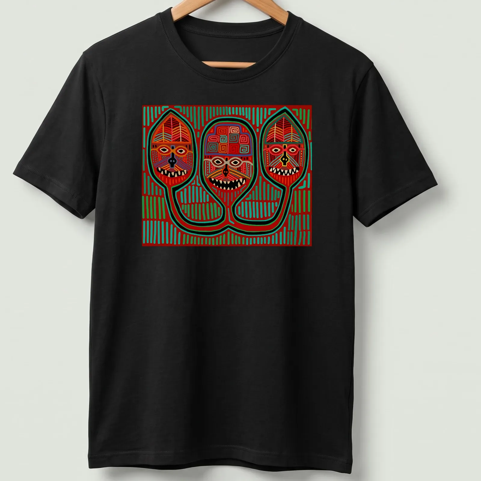 Vibrant geometric print featuring three tribal masks in red, green, yellow, black, and white — printed on a unisex t-shirt