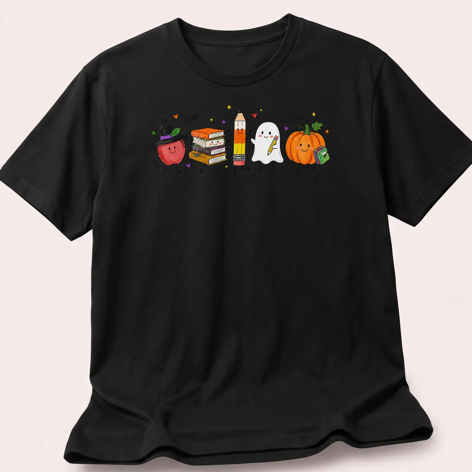 Kawaii illustration of cute school supplies in Halloween costumes — printed on a unisex t-shirt