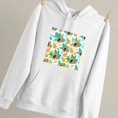 Tropical pattern featuring papaya fruit and leaves in orange and green — printed on a unisex hoodie
