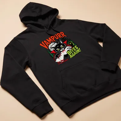 Vintage Halloween tee with a black cat in a vampire cape and humorous text — printed on a unisex hoodie