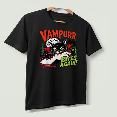 Vintage Halloween tee with a black cat in a vampire cape and humorous text — printed on a unisex t-shirt (angled view)