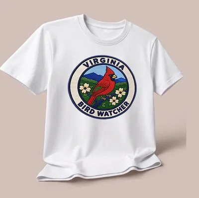 Vintage patch design featuring a Northern Cardinal on a birdwatching — printed on a unisex t-shirt (angled view)