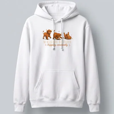 Cartoon Highland cow with the text 'WALKING BY FAITH tripping constantly' in playful colors — printed on a unisex hoodie