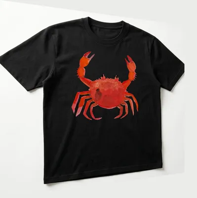 Watercolor print of a lively red crab with orange and black accents — printed on a unisex t-shirt (angled view)