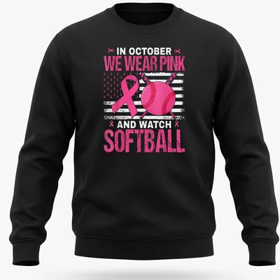 Bold graphic tee featuring pink ribbon and softball design — printed on a unisex sweatshirt