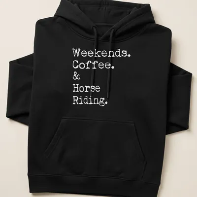 Distressed t-shirt featuring text: Weekends Coffee & Horse Riding. — printed on a unisex hoodie