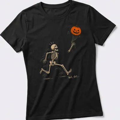 Playful line-art of a skeleton running with a pumpkin and humorous text above — printed on a women's shirt