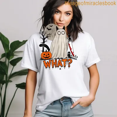 Kawaii ghost cat holding a knife with text WHAT? in bold above — printed on a women's t-shirt