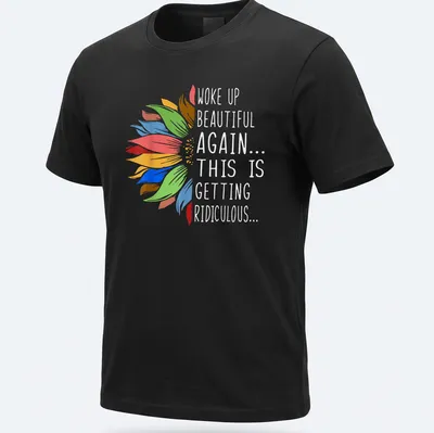Humorous t-shirt with sunflower and vibrant text about waking up beautiful.