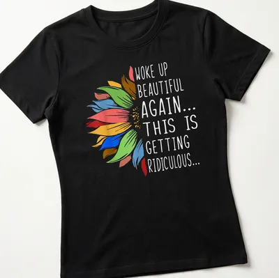 Humorous t-shirt with sunflower and vibrant text about waking up beautiful. — printed on a women's shirt