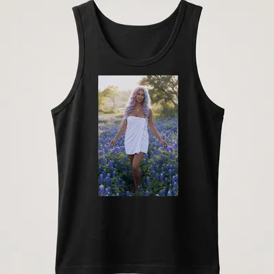 Photographic T-shirt featuring a woman in white dress among bluebonnet flowers — printed on a tank top