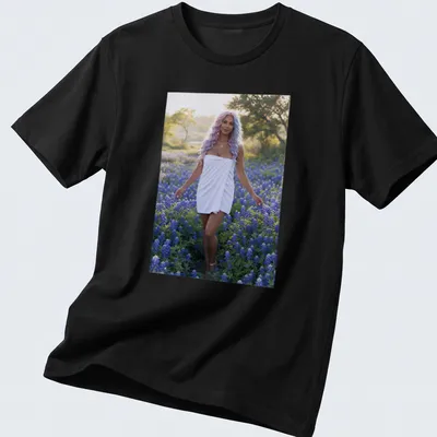 Photographic T-shirt featuring a woman in white dress among bluebonnet flowers