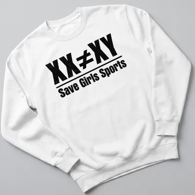 Bold distressed text graphic stating 'XX ≠ XY Save Girls Sports' in black and white — printed on a unisex sweatshirt