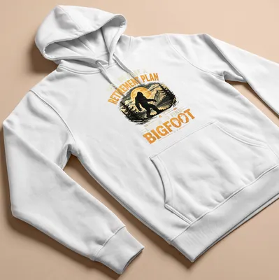 Funny retirement plan t-shirt featuring the text and Bigfoot illustration — printed on a unisex hoodie