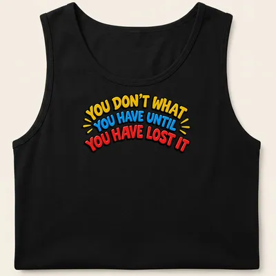 Bold typography t-shirt with the quote about appreciating what you have — printed on a tank top
